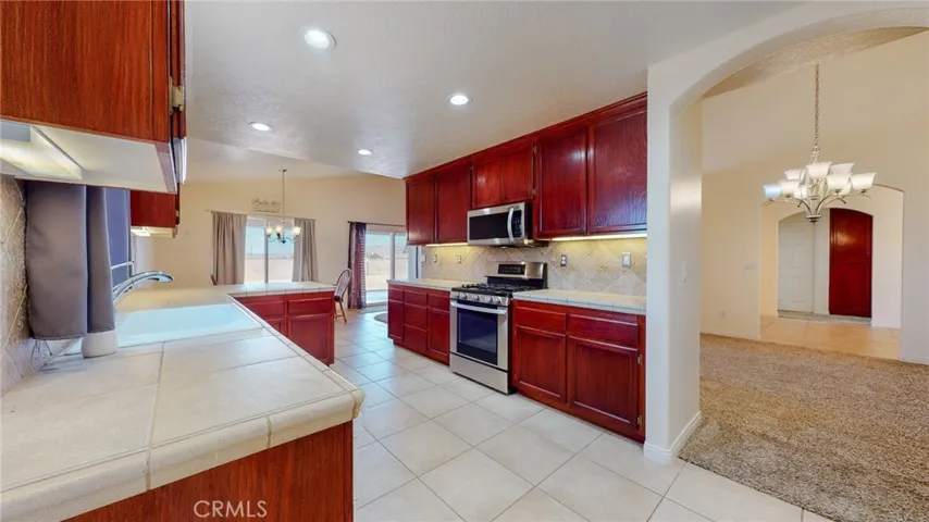 The open style of kitchen and dining for casual and formal affairs is a breeze!