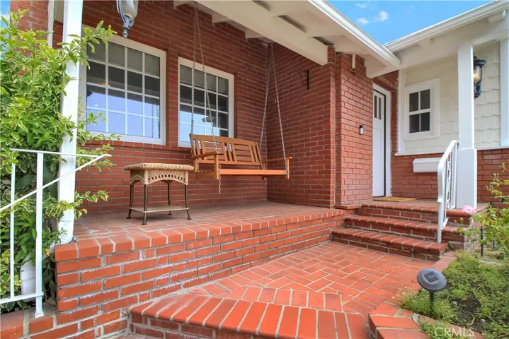 Front entrance with porch swing