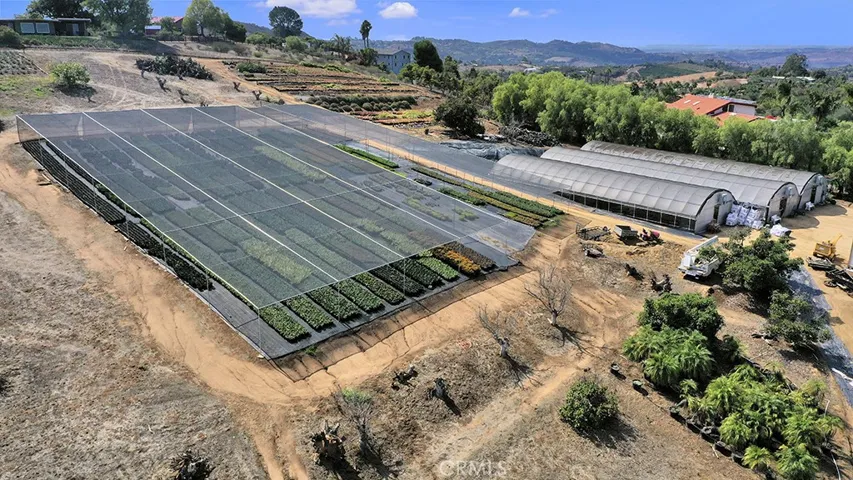 Shade houses and propagation house with heaters, boom irrigation, misters and timers