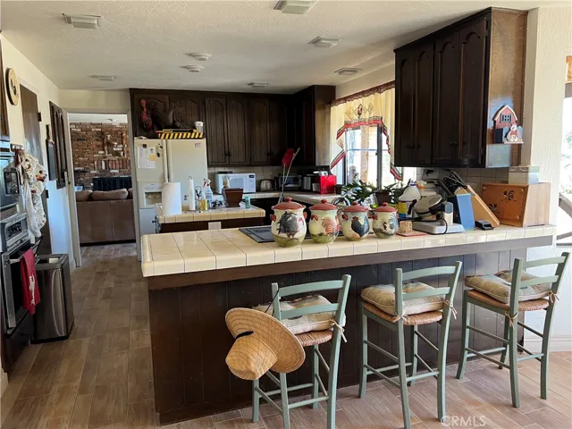 Kitchen with countertop bar seating