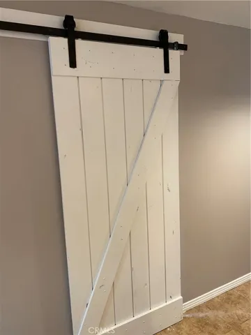BARN DOOR FIRST BEDROOM