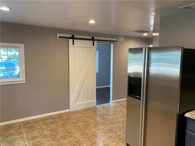BARN DOOR INTO BEDROOM