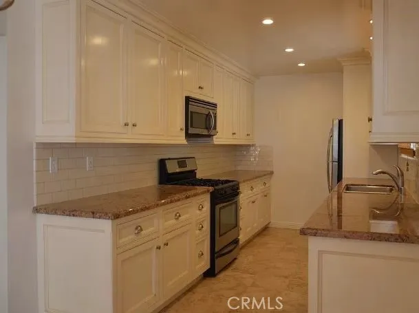 kitchen has been remodeled with new electric components, copper plumbing throughout home.