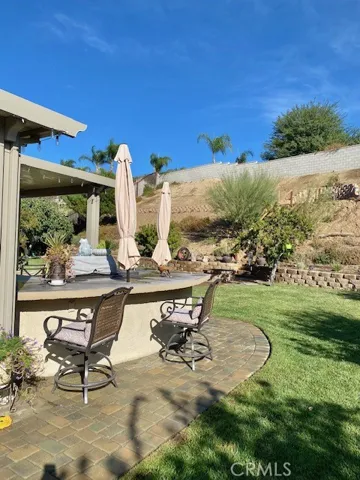 concrete outdoor kitchen with new BBQ and Fridge