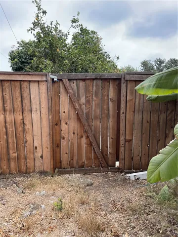far back fence with alley access.