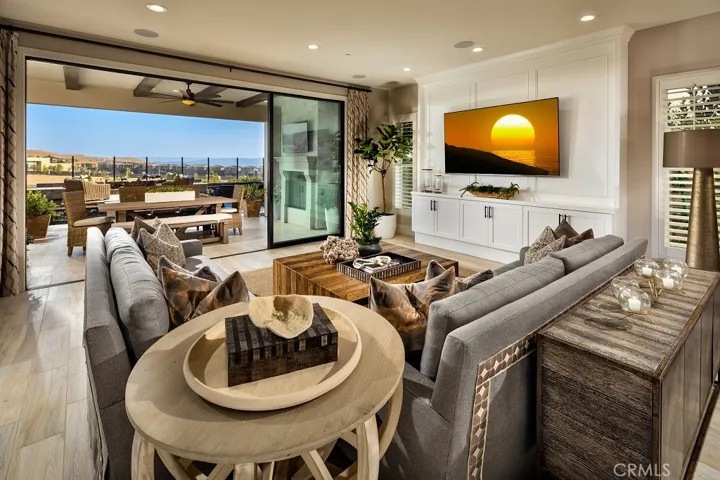 Family Room to Outdoor Room: Stanwick Tuscan - Beacon Collection
Photo(s) of Model Home - Not actual home for sale. 
Home is still under construction.