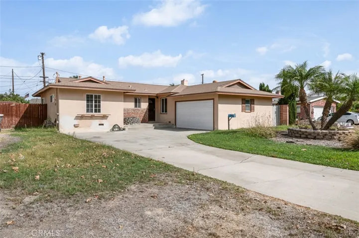Expansive driveway with potential RV parking on right side