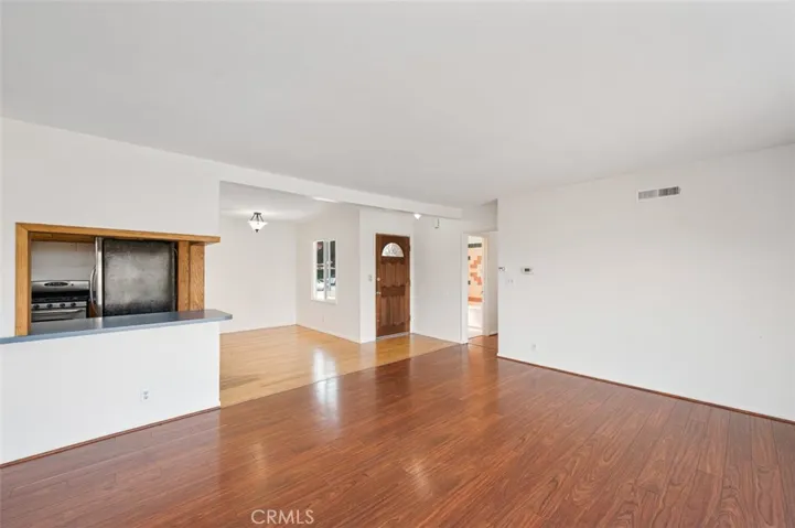 Living Room (looking NW) with view of Dining Room and Kitchen