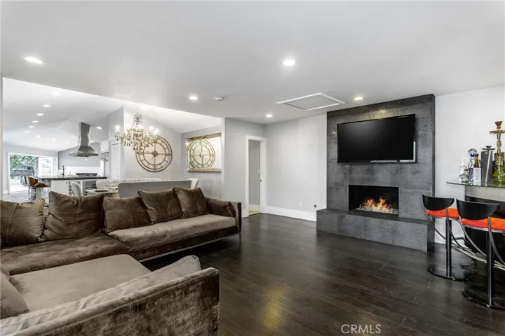 Relax by the cozy fireplace on a cool evening.