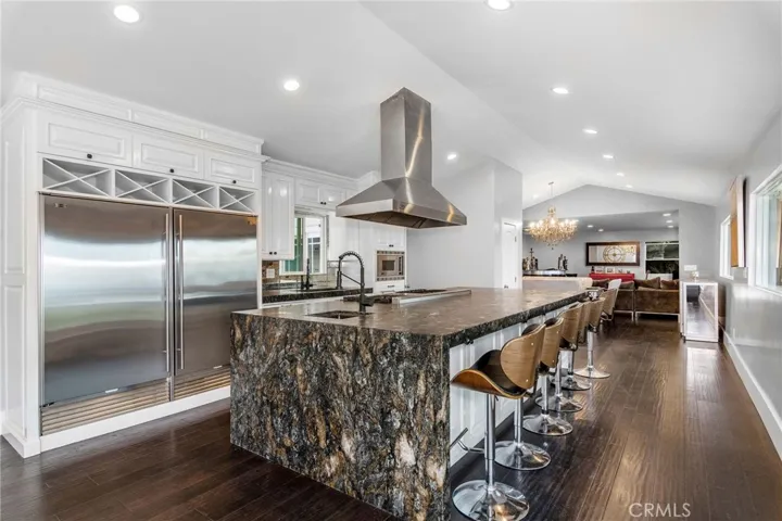 Remodeled kitchen with custom leather finished granite.