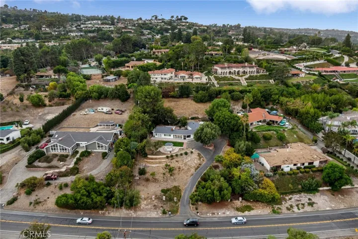 Front view of Home and vacant lot.