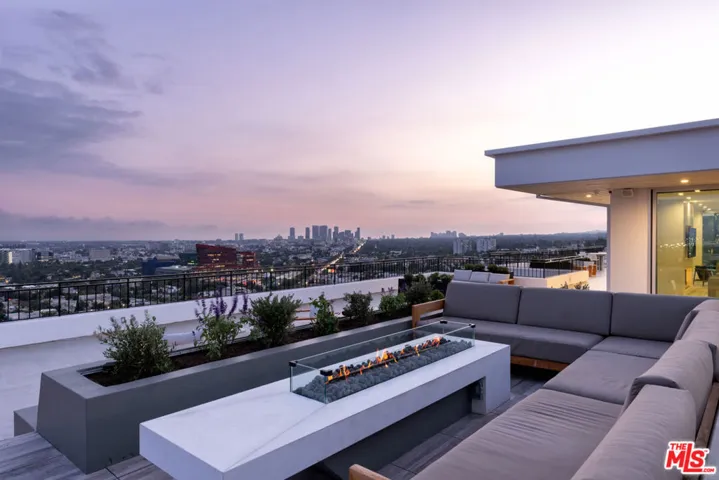 Newly renovated rooftop & outdoor lounge/firepit area