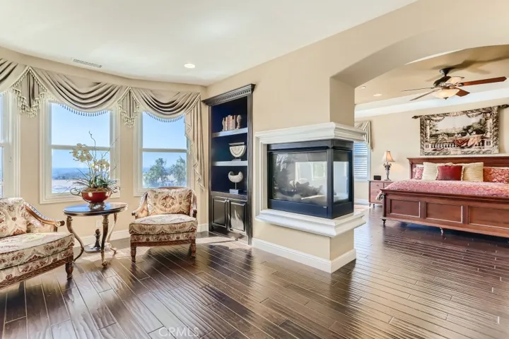 Primary bedroom retreat with pass through fireplace