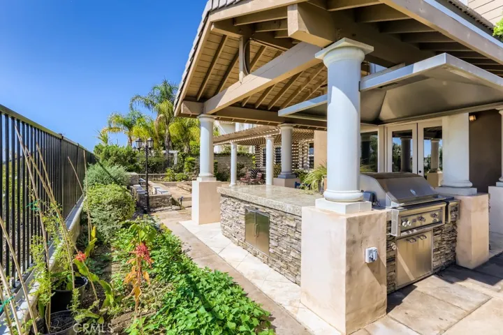 Covered outdoor kitchen BBQ with sink