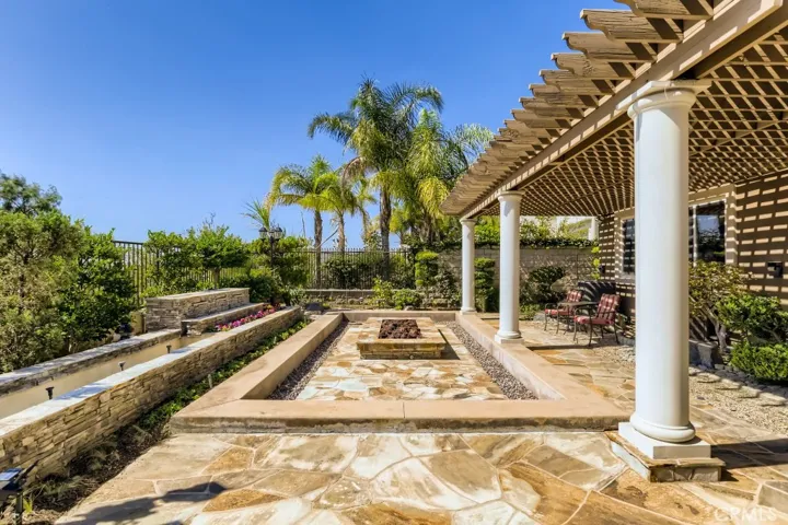 Expansive fire pit to enjoy the unparalleled views