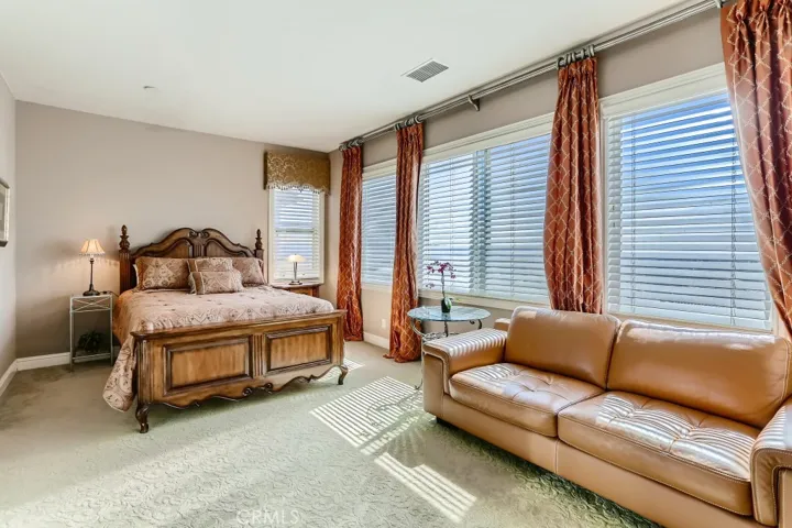 Secondary bedroom with expansive views and on-suite bathroom