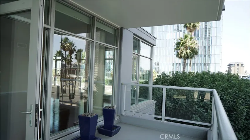 Large patio with eastern exposure and direct views to new civic center plaza.