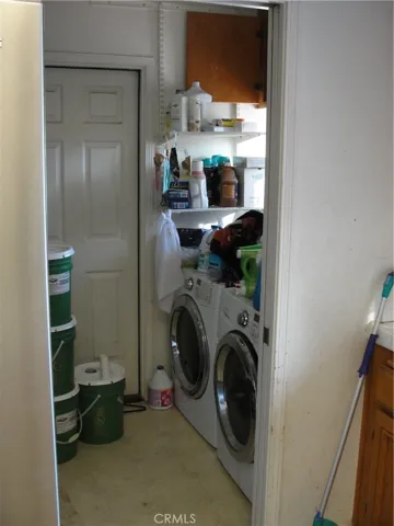 Laundry room adjacent to kitchen.  Direct garage access into home from here.