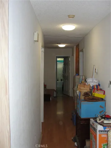 Long hallway leads to 4 BRs and 2 BAs.  Laminate flooring.