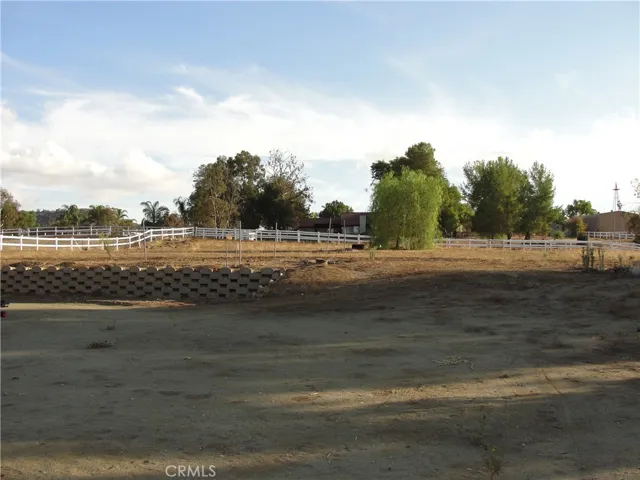 View of rear yard.  Almost 2 full acres with riding trails behind property.