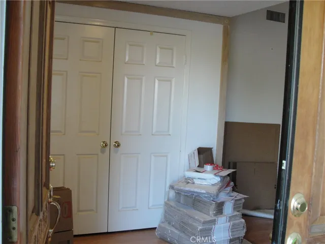 Interior foyer area with plenty of storage for coats