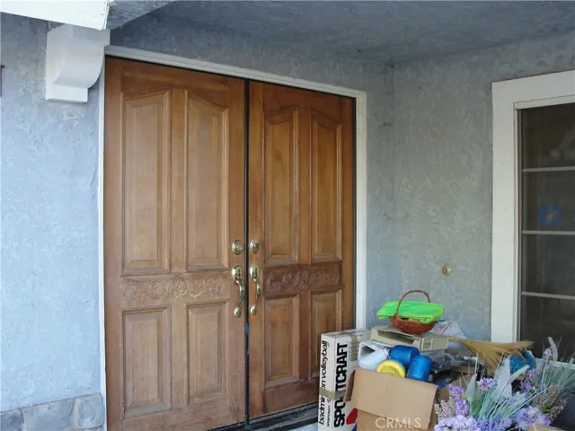 Double door entry with covered porch.