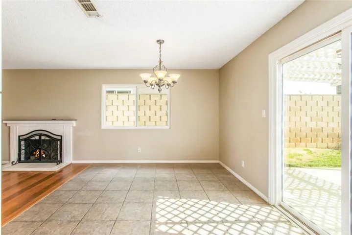 Living room with wood burning fireplace