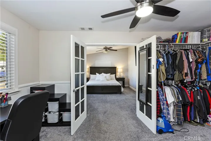 Huge Walk-in Closet with a office area