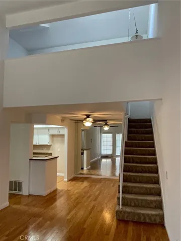 Living room and stairway to upstairs loft