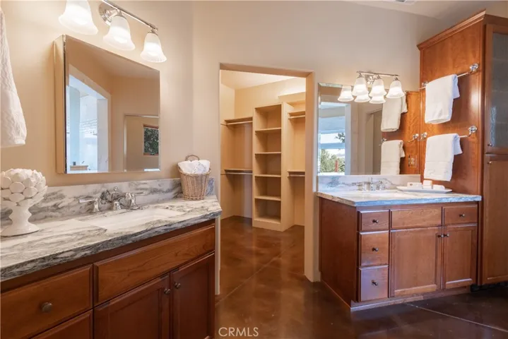 Master bathroom with large walk in closet
