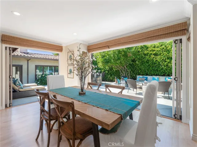 Informal dining in great room toward rear patio
