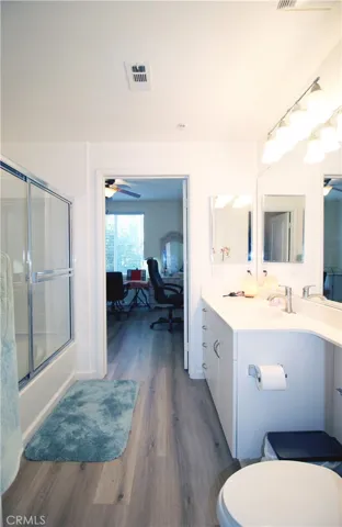 Shower/tub combo with enclosure