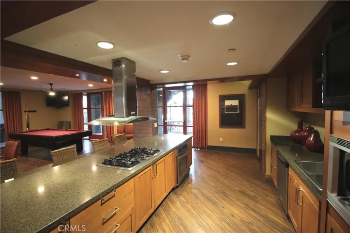 Cooking area and huge refrigerator in clube house