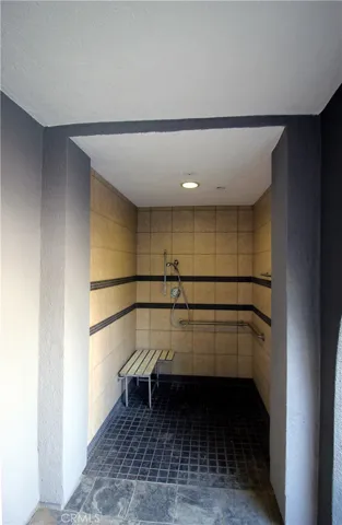Outside shower next to pool area