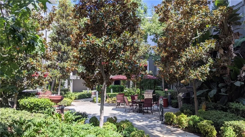 Courtyard has tree shaded areas and walkways