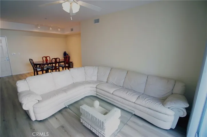 Living room spacious enough to fit a L-shaped sofa