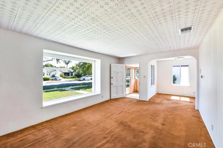 Living room looking into dining