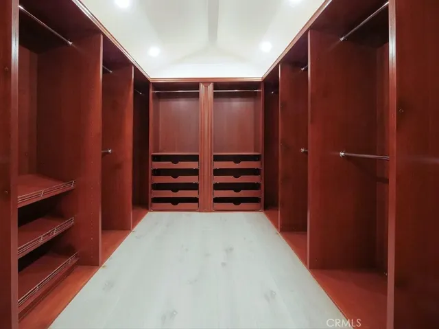 walk-in closet in master bedroom