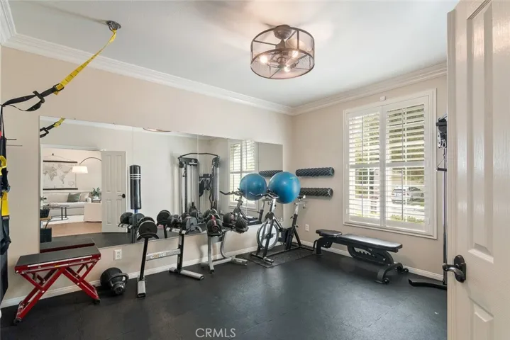 Extra room to the immediate right of the front door, which is currently being used as a gym, can also be used as an office space or addtional room.