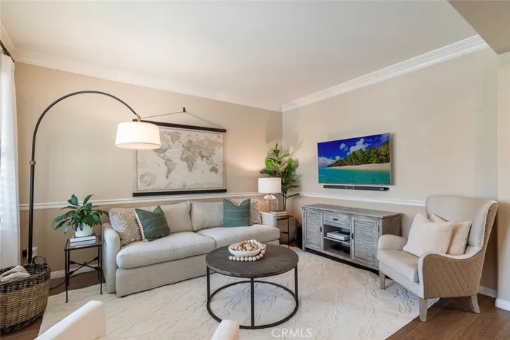 Upon entering the home and to the immediate left, is the sitting room, perfect for reading, reflection or entertaining.