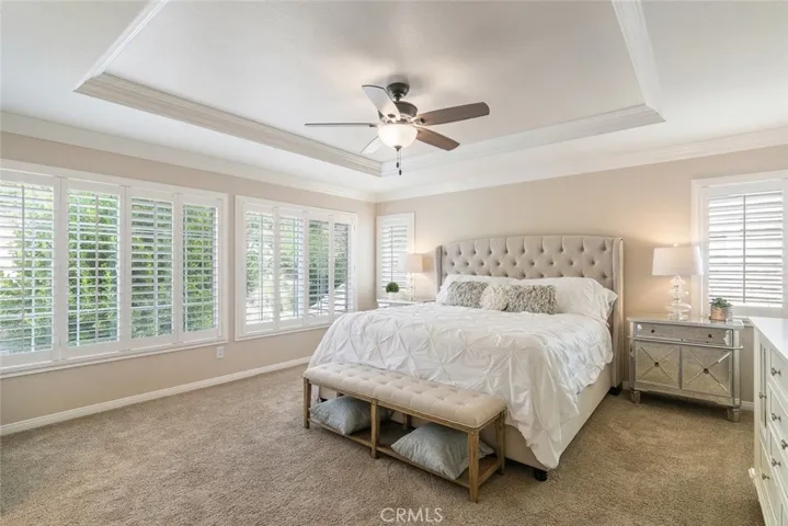 Your large Master suite awaits you, with new Crown moldings in the ceiling accent, as well as throughout the room.  Master also overlooks your shark-free pool.