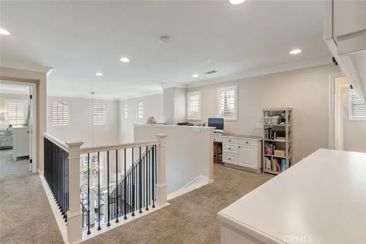 Large upstairs area overlooks the 2 story ceilings.