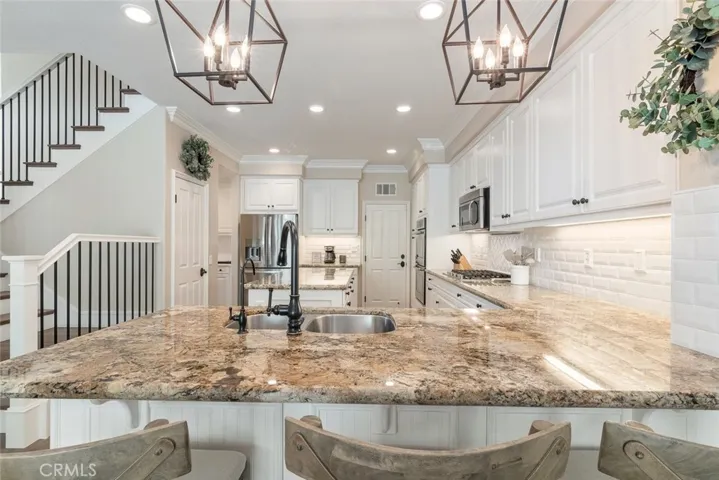 Perfect place to sit and enjoy conversations, while preparing meals.  This kitchen will truly be the envy of all your friends and family.