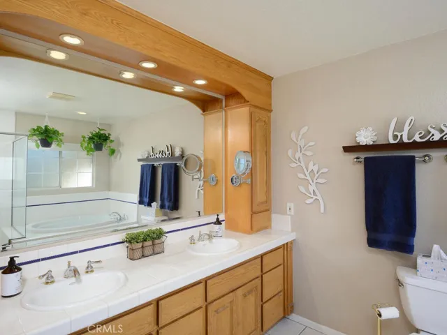 Master bath with dual sinks and recessed lighting