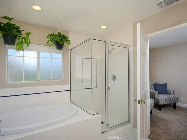 Master bath with soaking tub and separate shower