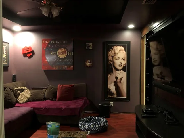 Media room with swival tv that can turn all the way around to Lounge/Bar area.  Or the wall could easily be removed for one large room.