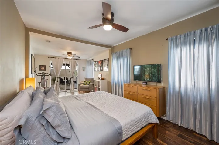 Bedroom looking towards sitting area to sliding door.