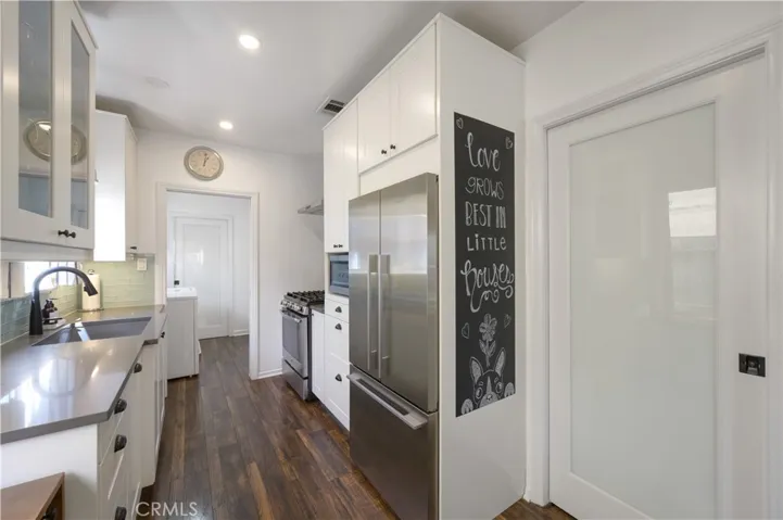 Pocket doors off hall, laundry room and kitchen