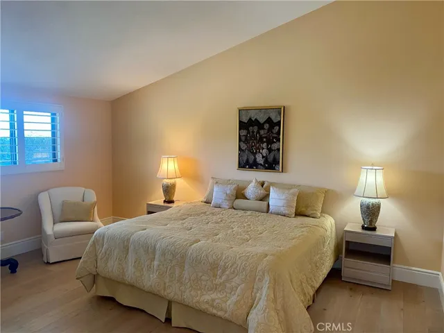 Master Bedroom with Plantation shutters, French Oak flooring