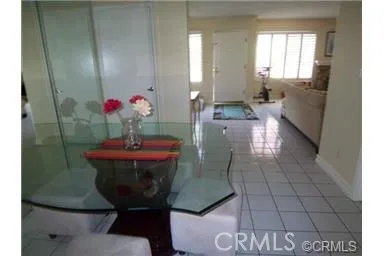 View from dining room opens to the kitchen.